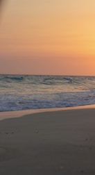 A serene beach scene at sunset, inviting relaxation and escape.