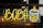 A bright neon sign featuring the word 'BOBA' in large yellow letters next to a neon depiction of a bubble tea cup filled with boba pearls, outlined in white and yellow. The sign is mounted behind a glass panel, with a dark and slightly reflective background.