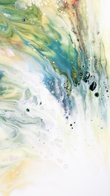 A fluid abstract composition featuring swirling patterns of blues, greens, yellows, and whites. The textures resemble flowing water or marble with hints of bubbles and speckles throughout.