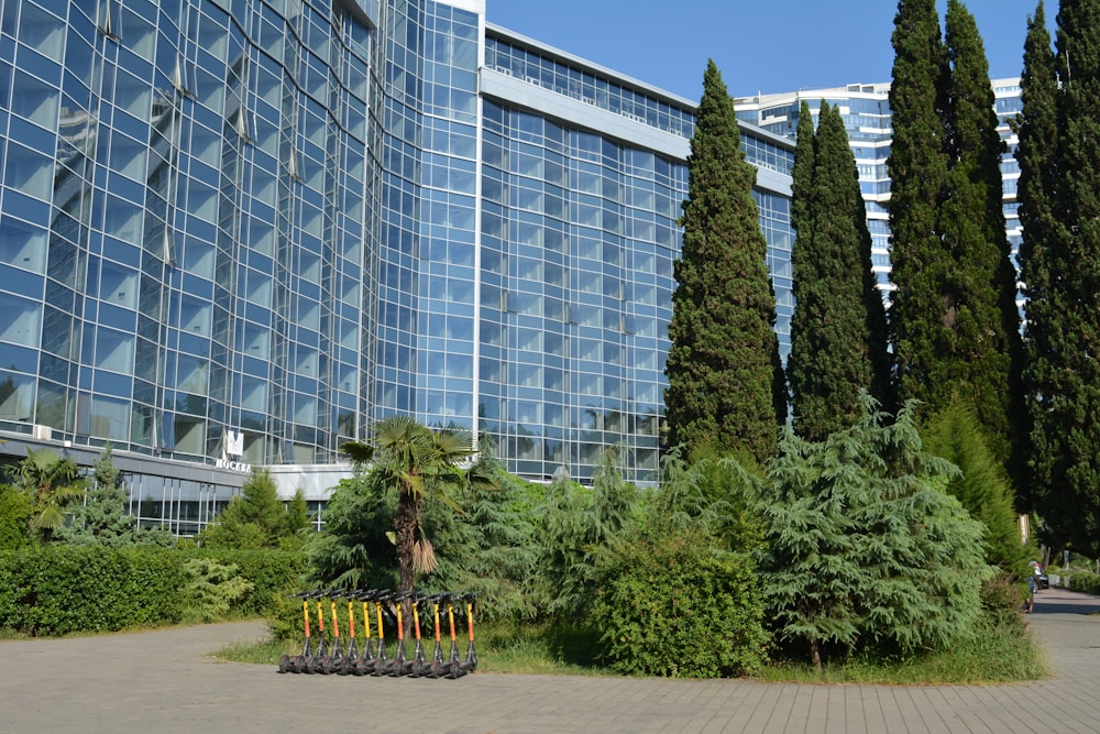 a large building with a lot of trees in front of it