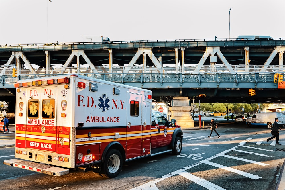 an ambulance is parked on the side of the road