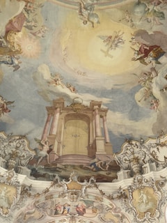 A monumental fresco inside a church, blending spiritual light and celestial motifs in warm tones.