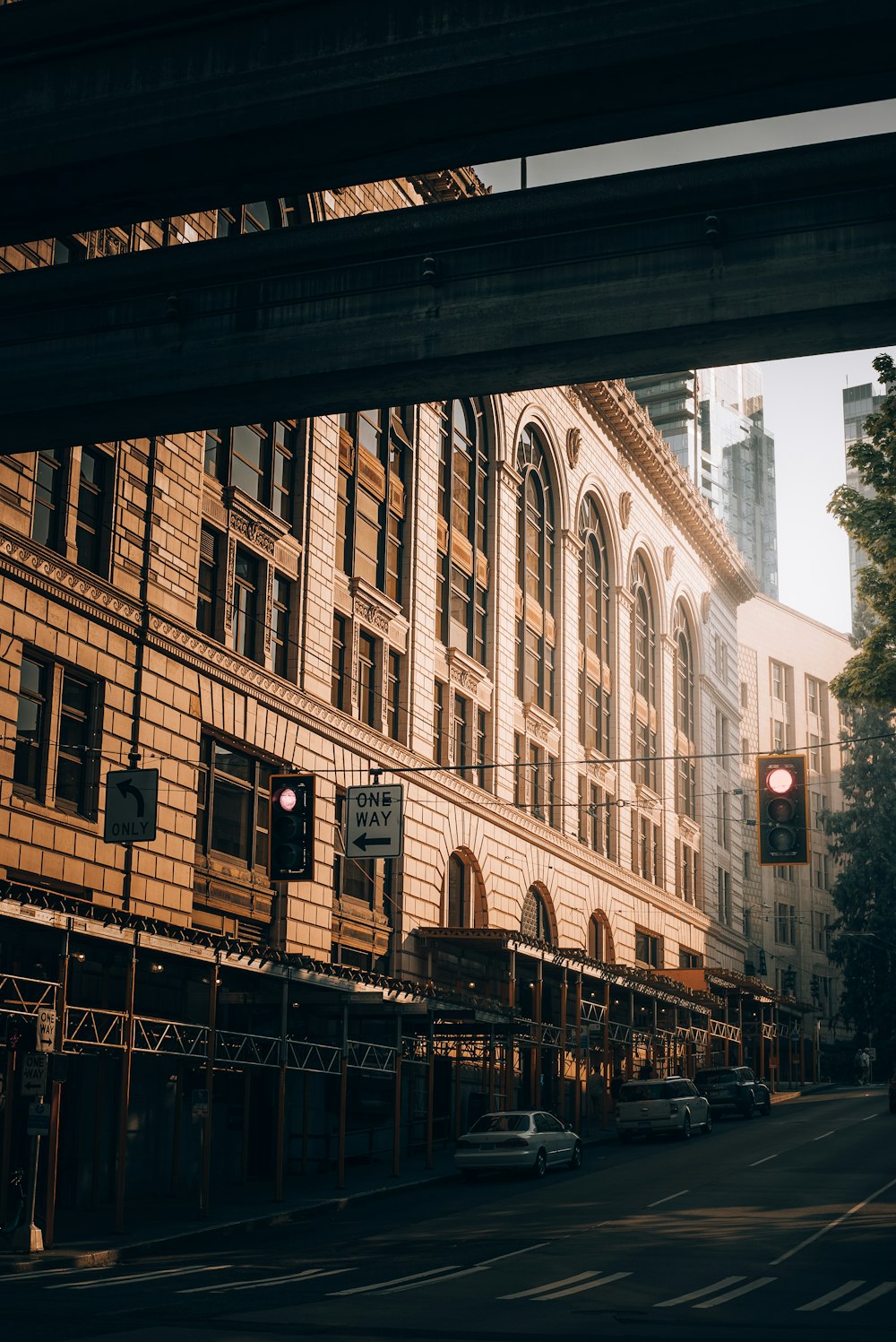 a traffic light on a city street with a building in the background