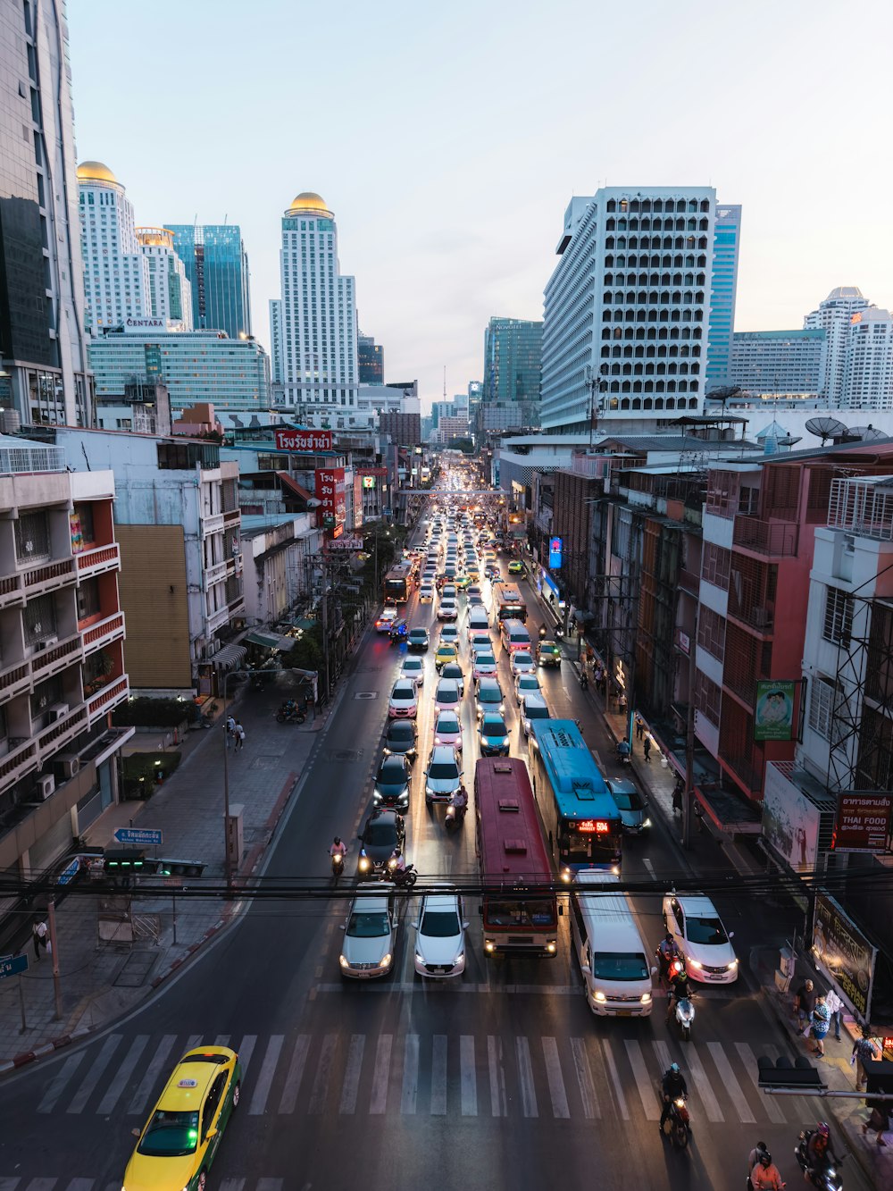 a city street filled with lots of traffic