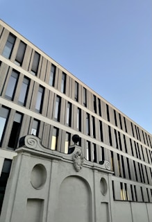 Wide shot of a modern building facade featuring elegant and sturdy decorative elements.