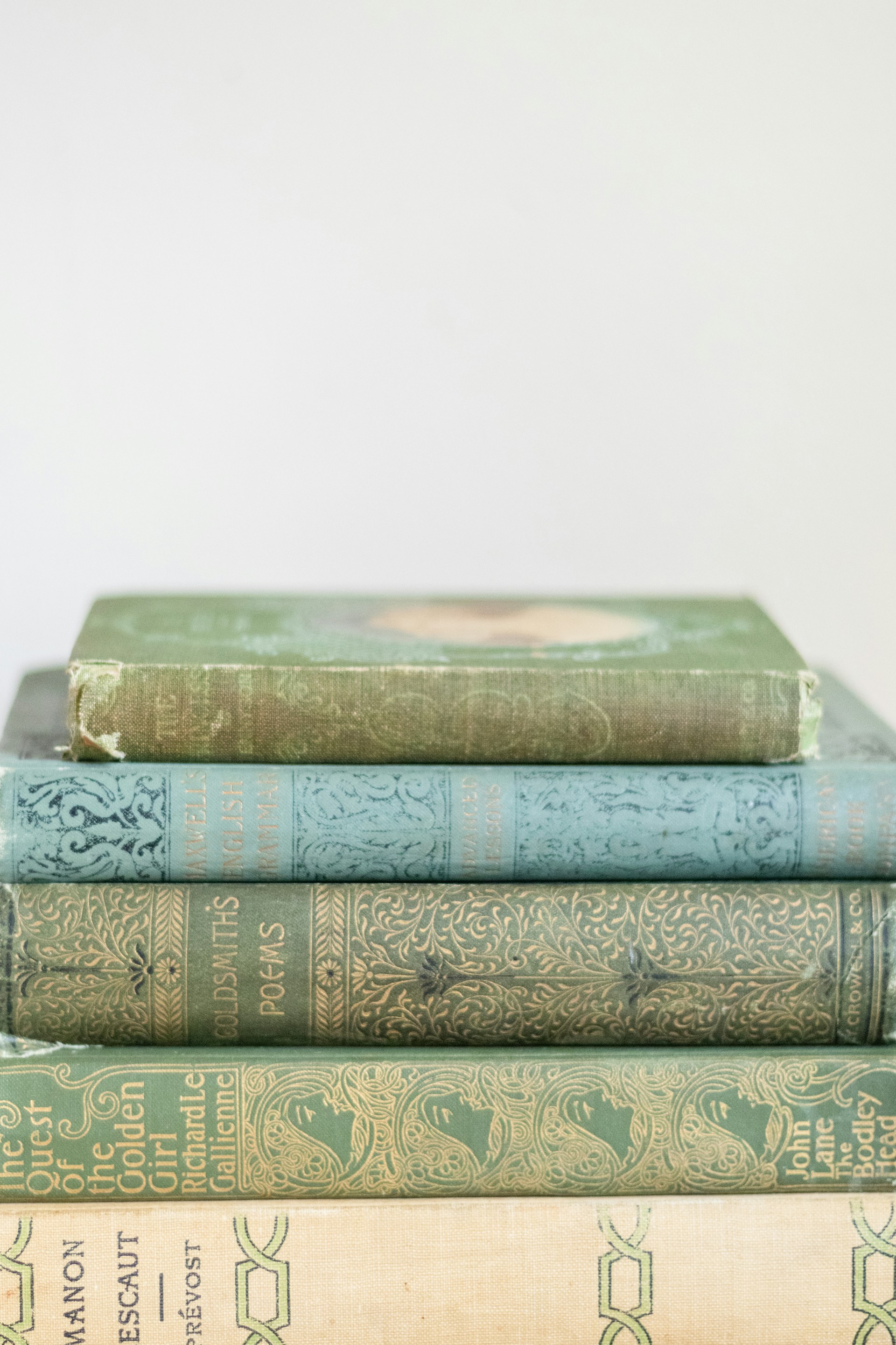 a stack of books sitting on top of each other