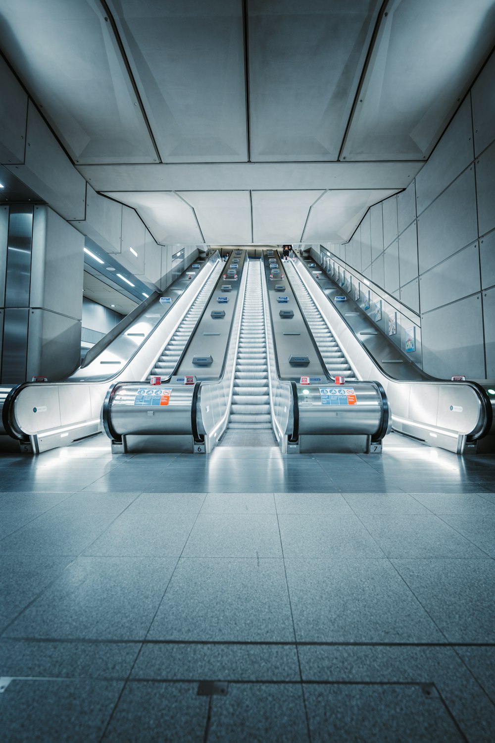 an empty escalator in a subway station