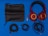 A set of red and gold over-ear headphones with a black leather carrying pouch lies beside various audio cables and a gold-plated audio adapter on a blue background. The cables include a coiled cable, a straight cable, and an additional cable with connectors.