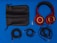 A set of red and gold over-ear headphones with a black leather carrying pouch lies beside various audio cables and a gold-plated audio adapter on a blue background. The cables include a coiled cable, a straight cable, and an additional cable with connectors.