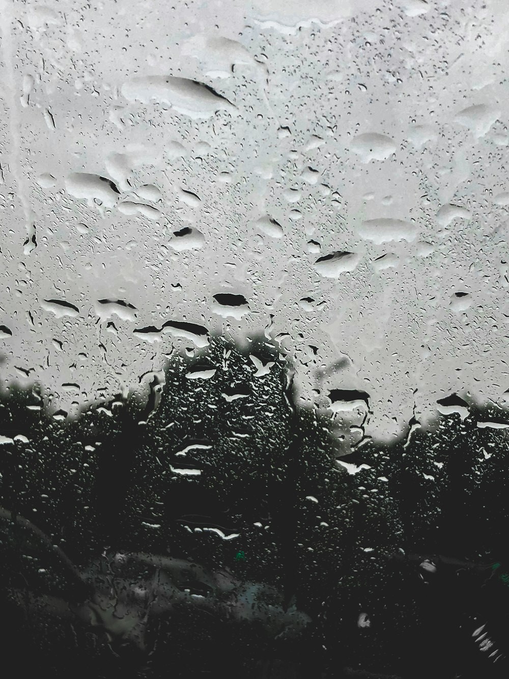 rain drops on the windshield of a car