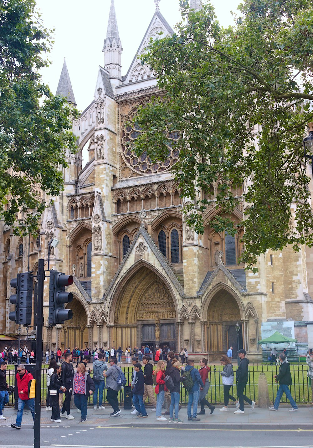 a group of people standing in front of a building