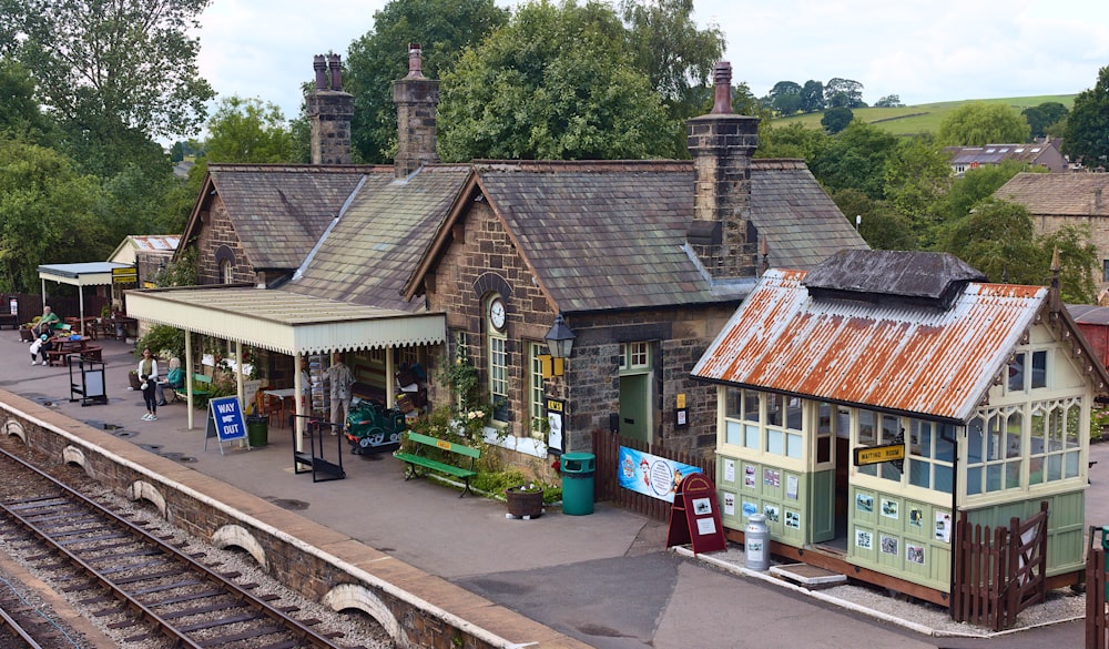 a train station with a train on the tracks