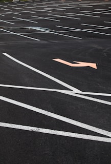 A freshly painted parking lot with clear yellow lines.