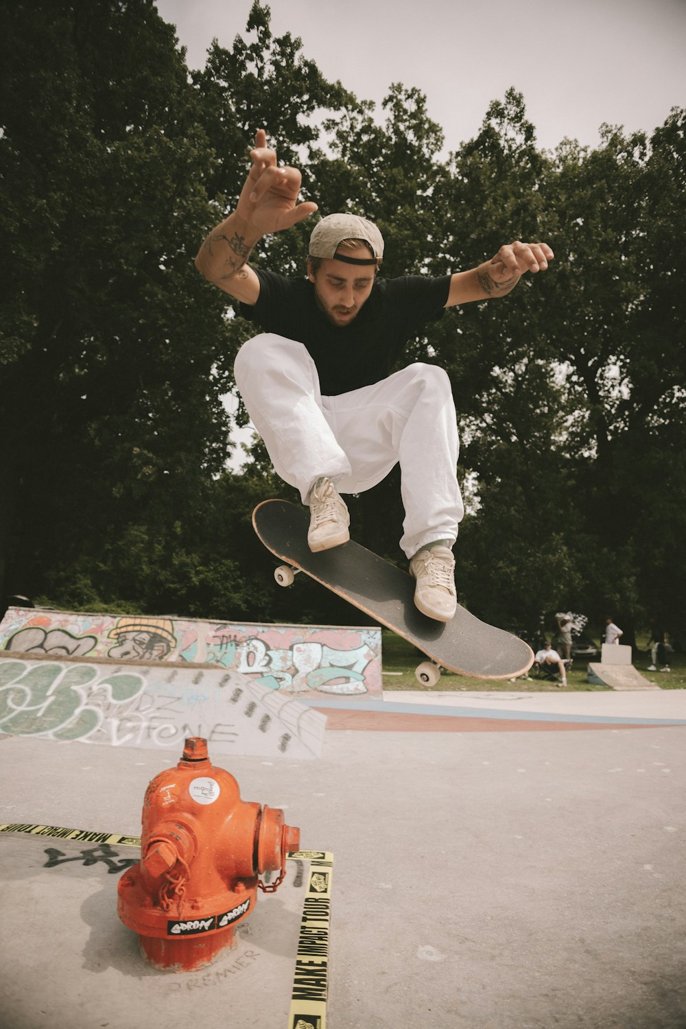 a man flying through the air while riding a skateboard