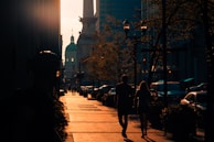 A quiet moment of reflection by the Shankly Gates, bathed in golden evening light.