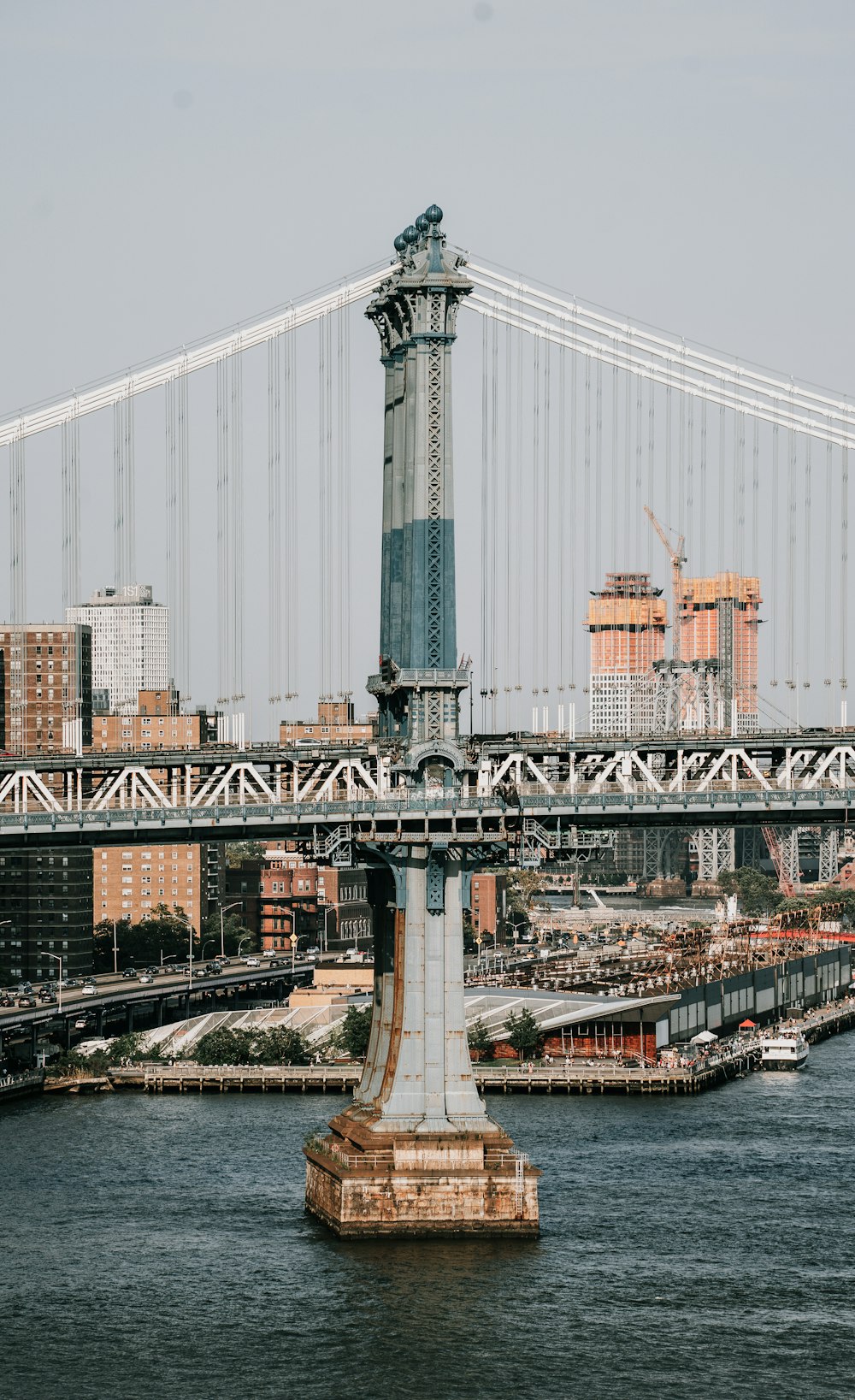 a view of a bridge over a body of water