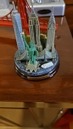 A finely crafted 3D printed model of New York City skyline highlighting the Statue of Liberty and skyscrapers.