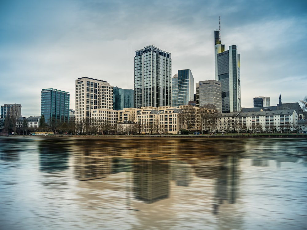 a view of a city with a river in front of it