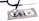 A stethoscope rests on top of a stack of one-dollar bills, suggesting a connection between healthcare and financial costs.