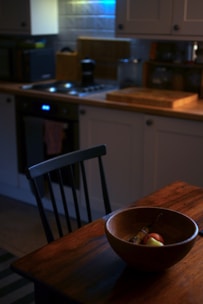 A cozy kitchen scene with groceries freshly delivered and unpacked under warm lighting.