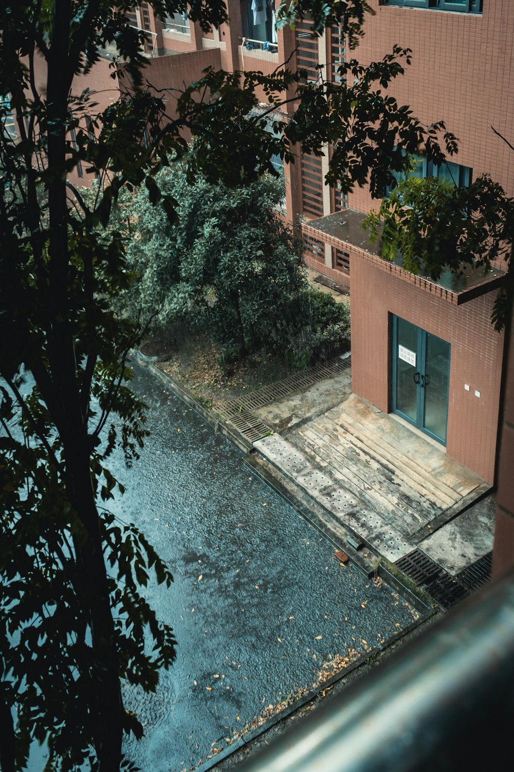 an empty parking lot next to a building