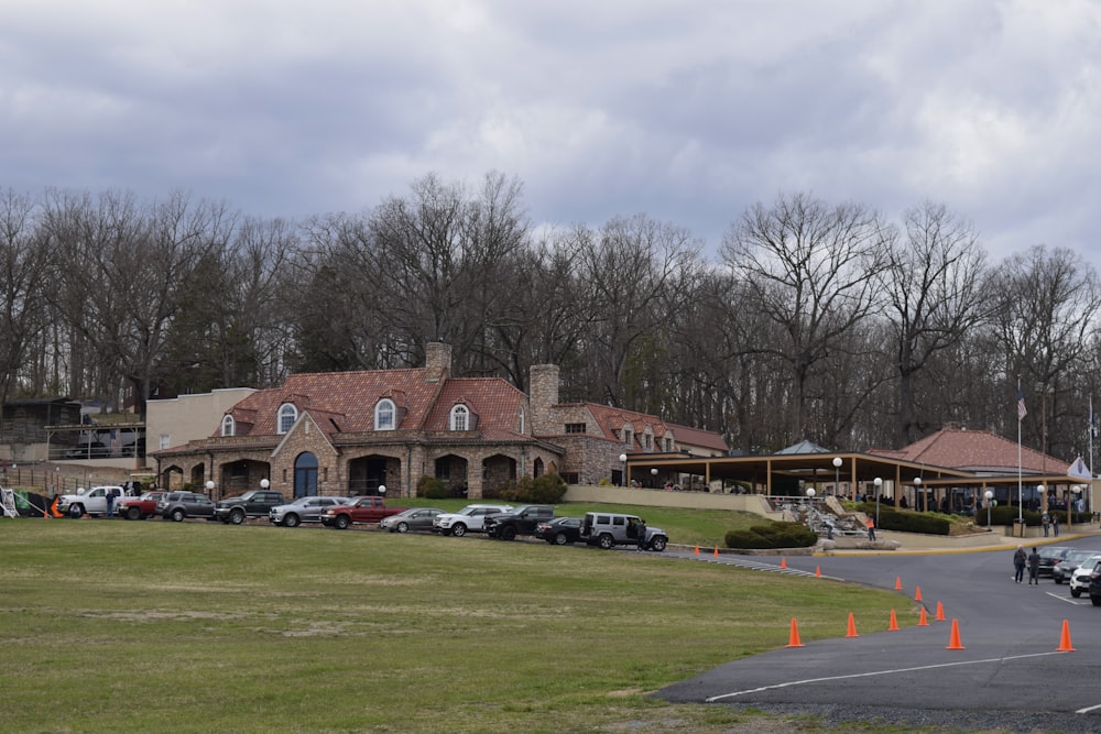 a lot of cars parked in front of a building