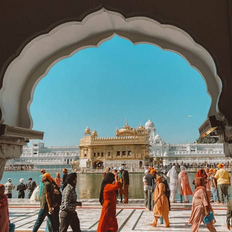 a group of people standing in front of a building