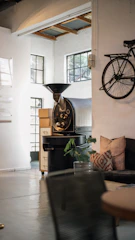 A sleek 360-degree virtual tour interface showcasing a cozy artisanal coffee shop interior.