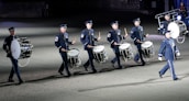 Close-up of military drummers in traditional uniforms during the show.