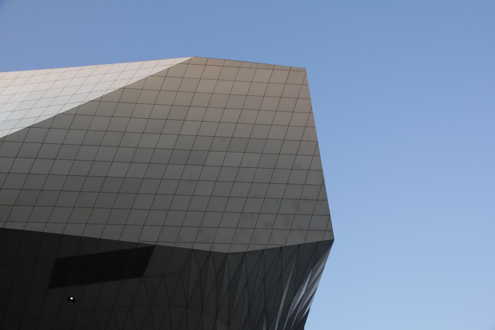 a tall building with a sky background