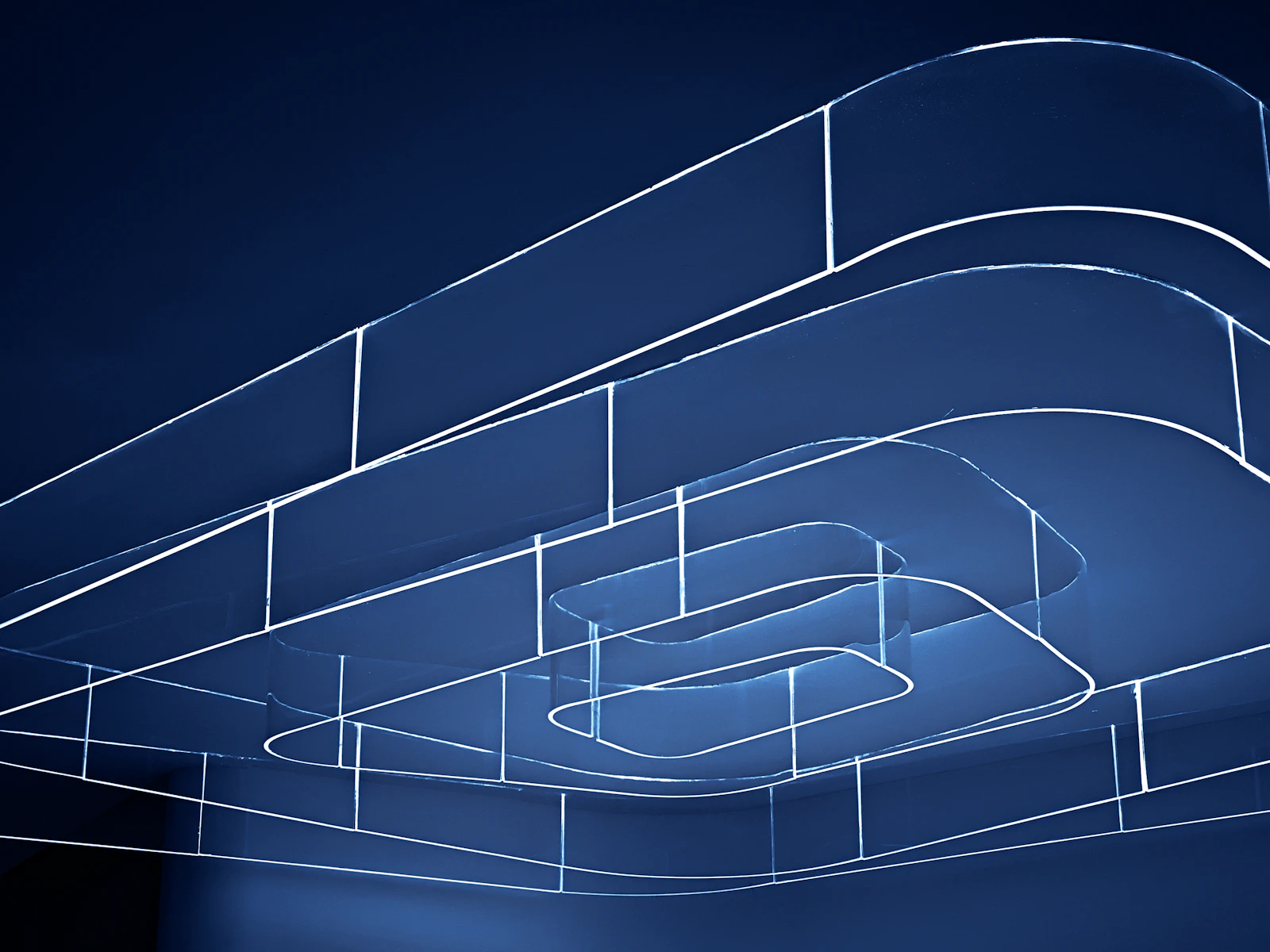 An abstract blue field of fine intersecting technical lines