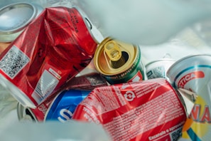 Recovered materials stacked and ready for recycling, highlighting metallic textures and sustainable colors.