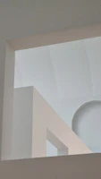 Abstract minimalist photo of geometric shapes and muted colors, embodying simplicity.