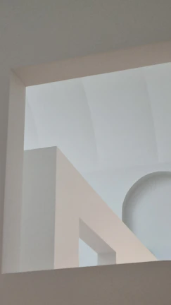 Abstract architectural sketch with watercolor washes emphasizing light and form.