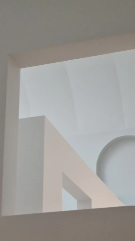 Abstract minimalist photo of geometric shapes and muted colors, embodying simplicity.