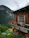 Cozy rustic cabin balcony overlooking the Douro river at sunset