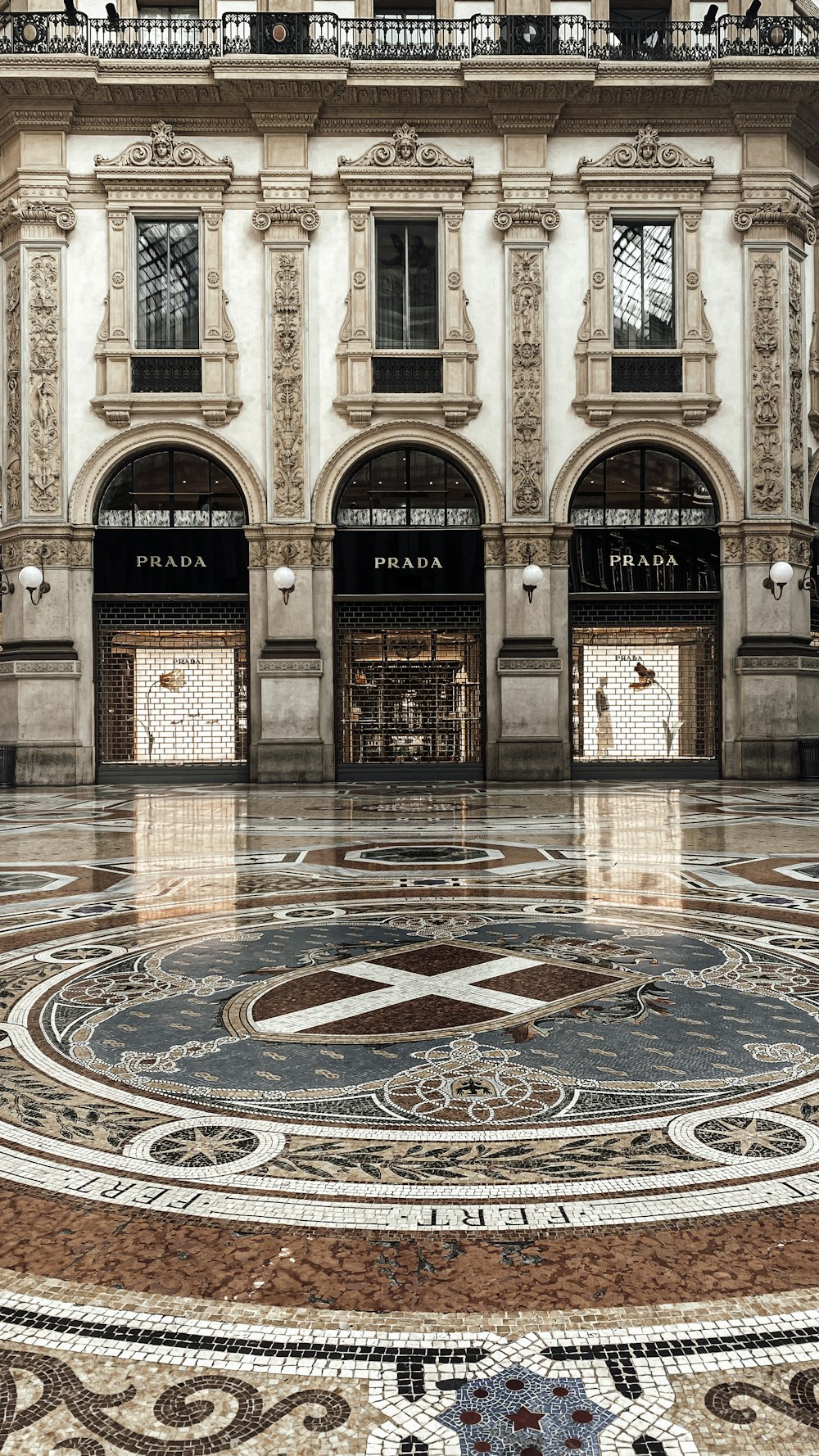 a large building with a circular floor in front of it