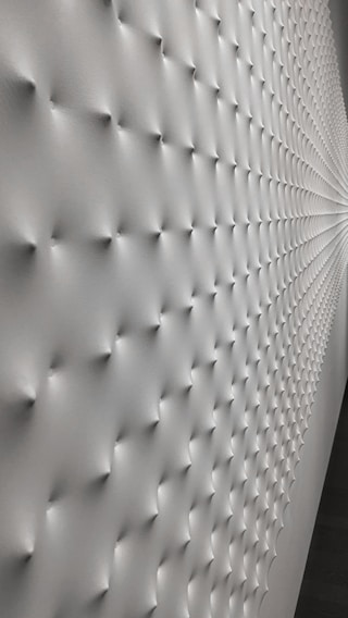 Photo of a modern industrial gypsum finishing project showcasing smooth, precise wall textures.