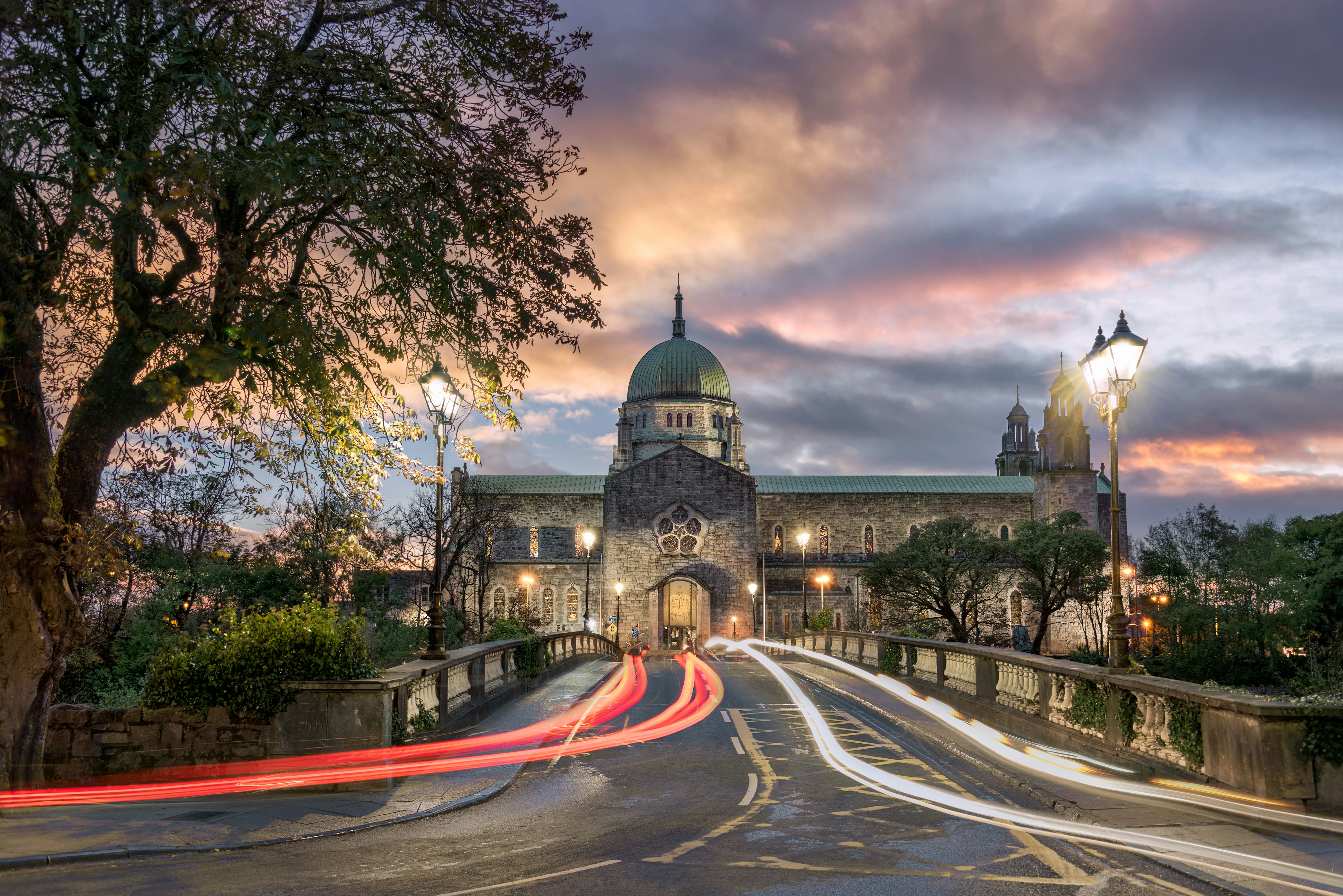 a long exposure shot of a city street at dusk