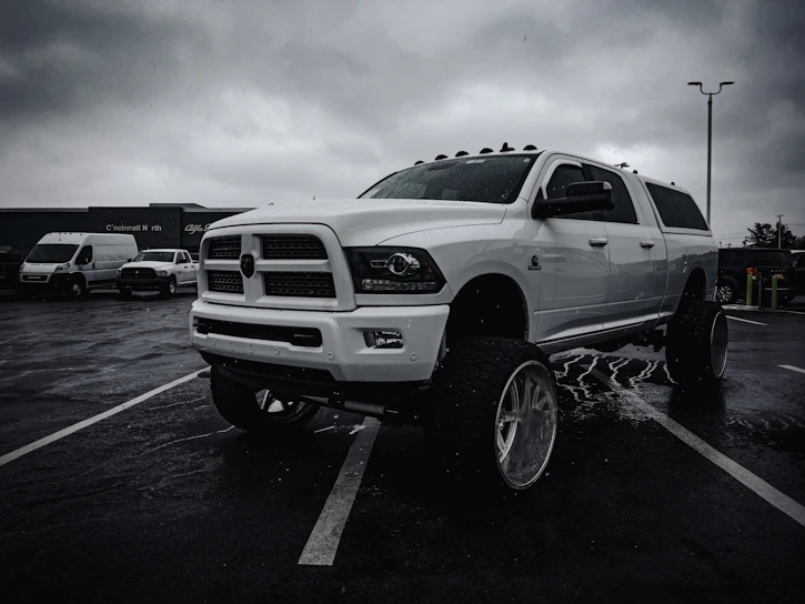 a large white truck parked in a parking lot