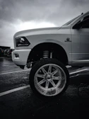 Screenshot of sekhonmountaintruxltd.mbwebsitepros.com homepage featuring rugged mountain truck visuals.