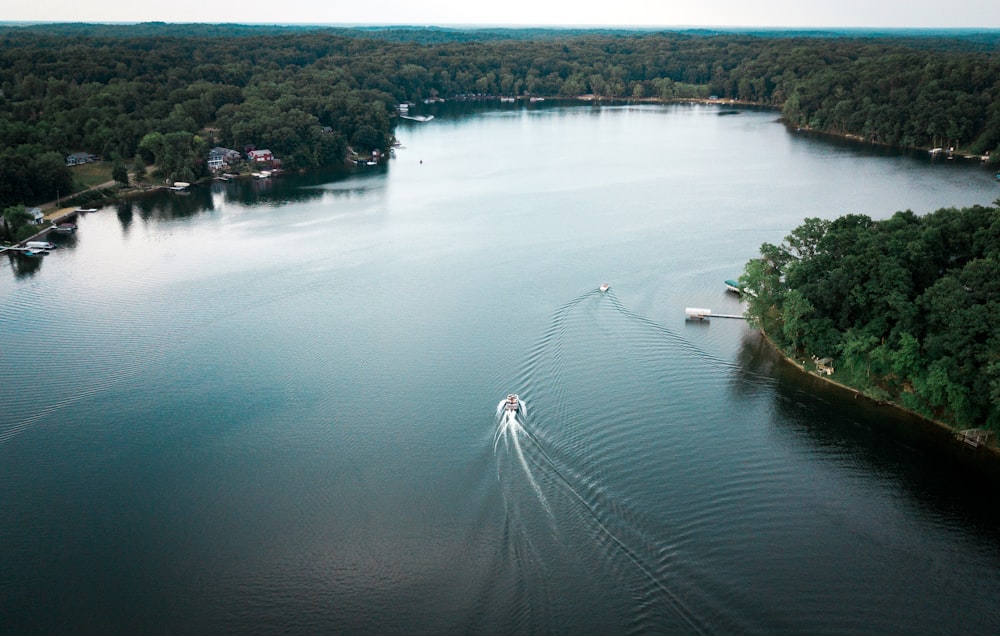 a boat traveling across a large body of water