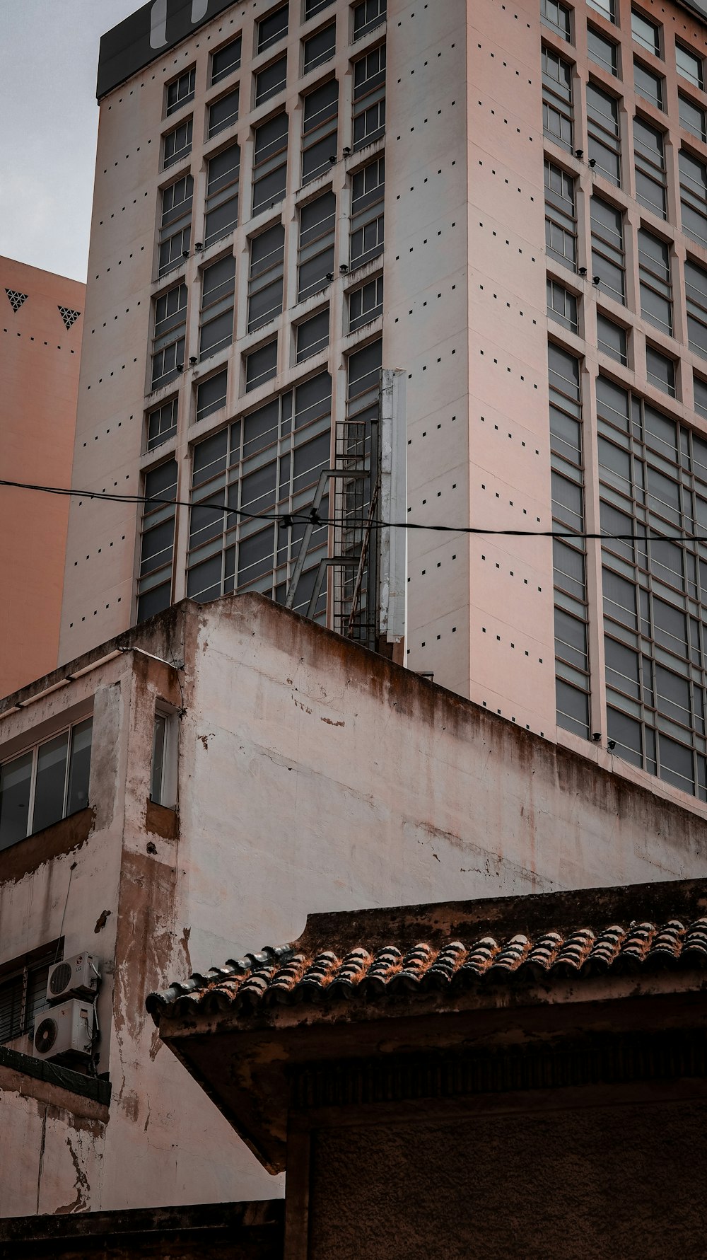 a tall building with a clock on the side of it