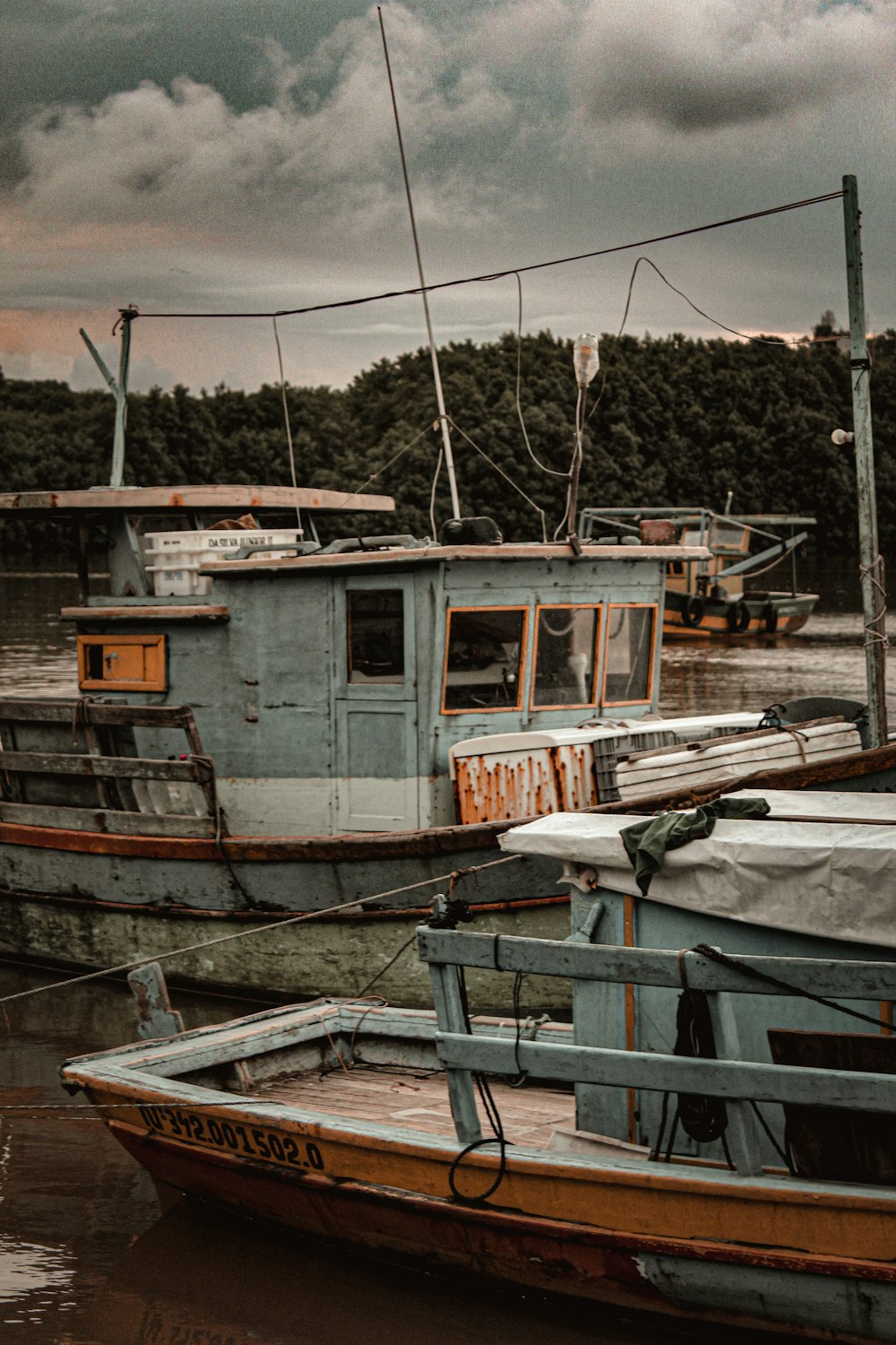 a couple of boats that are sitting in the water