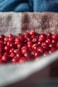 a close up of a bowl of cranberries