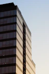 a tall building with a clock on the side of it