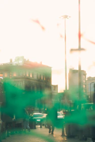 A sunset cityscape with digital overlays representing technology improving urban life.