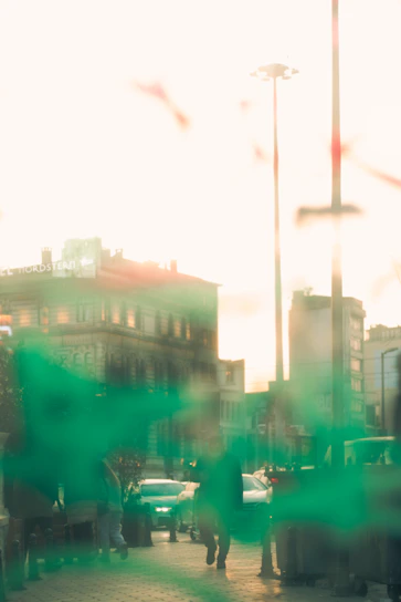 A surreal cityscape fading into a glowing horizon under a darkening sky, symbolizing the edge of time.