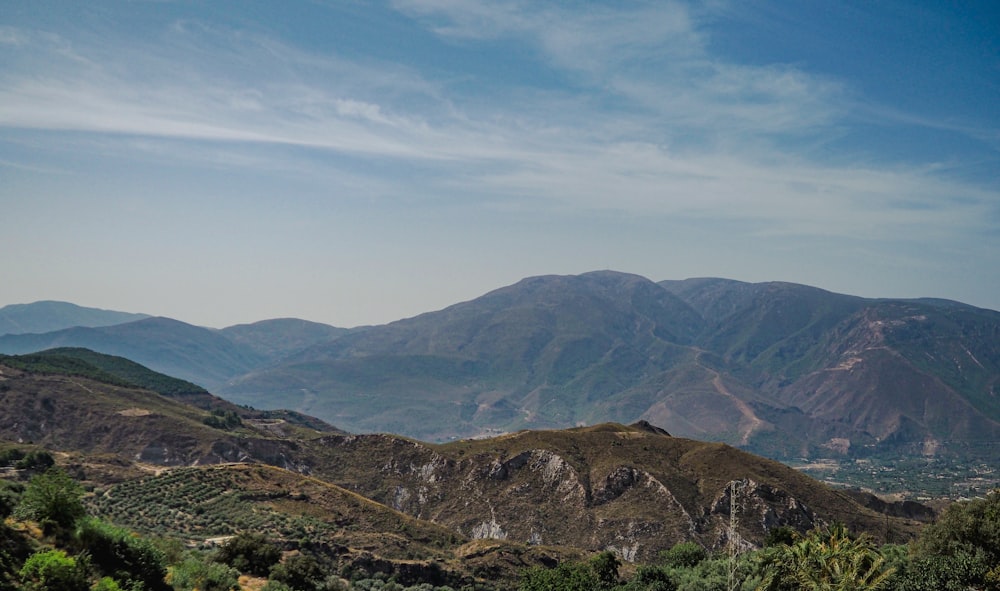 a view of a mountain range from a distance