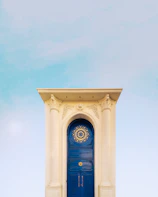 Close-up of a galpon entrance featuring elegant dark blue and gold design details.